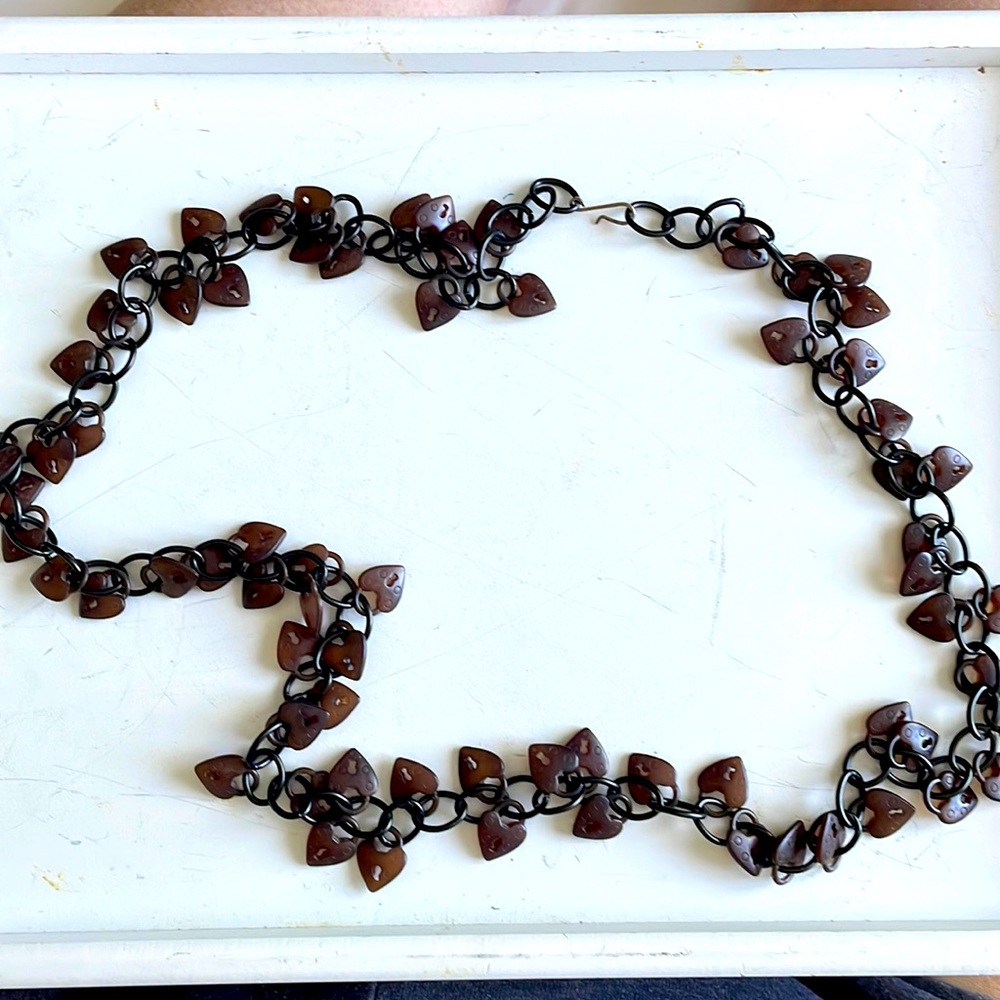 Vintage lightweight long necklace. Heart locks are around the whole thing.